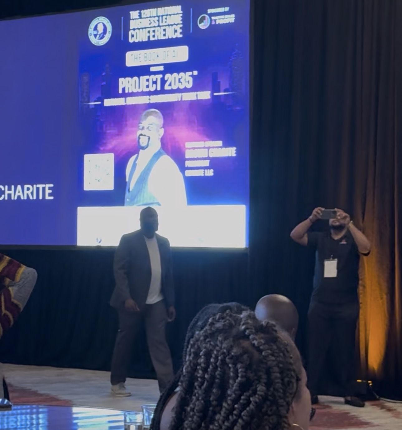 Brown Charité on stage at the Booker T. Washington Book of AI conference in Atlanta