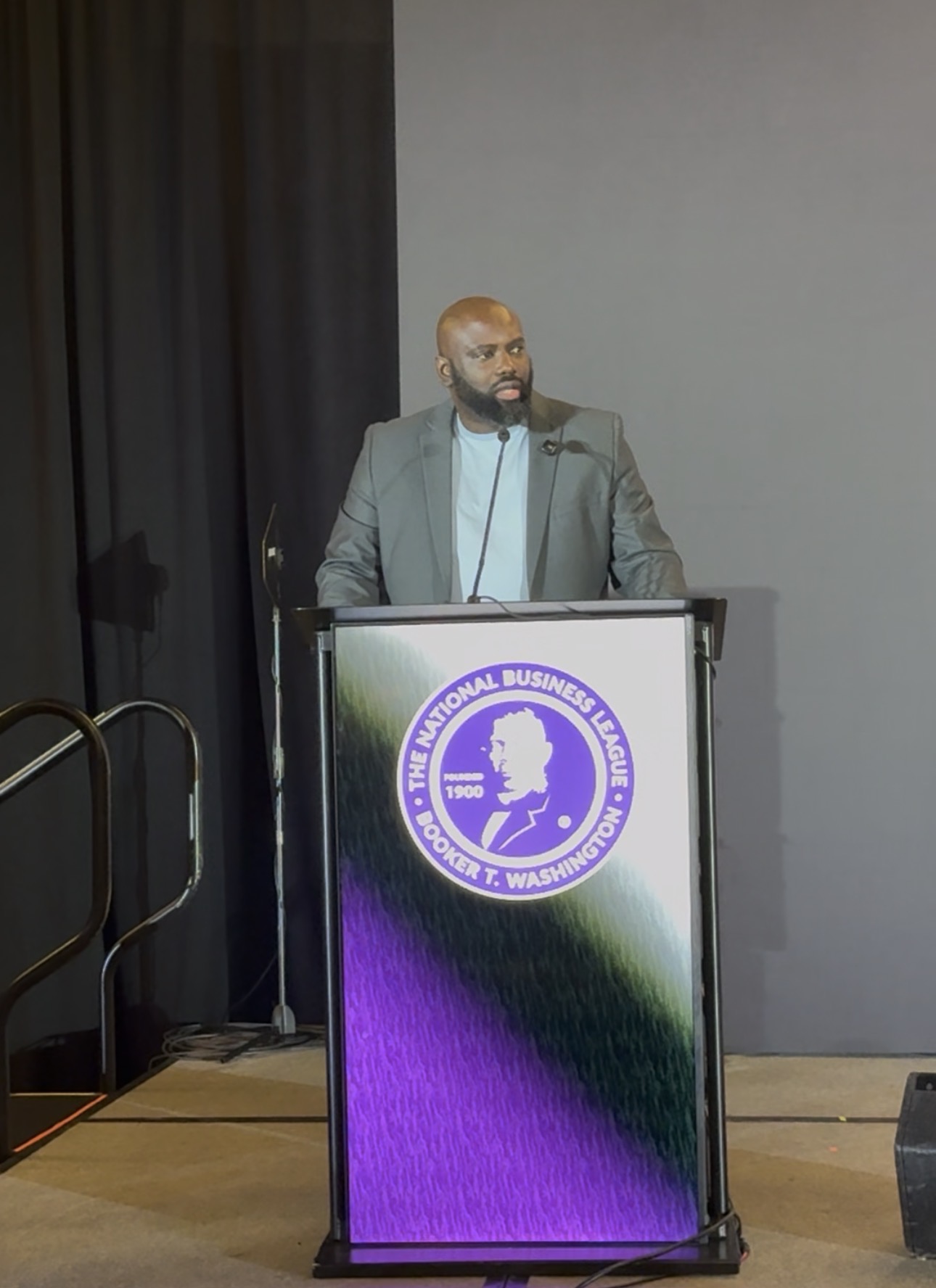 Brown Charité speaking at the Booker T. Washington Book of AI Conference in Atlanta