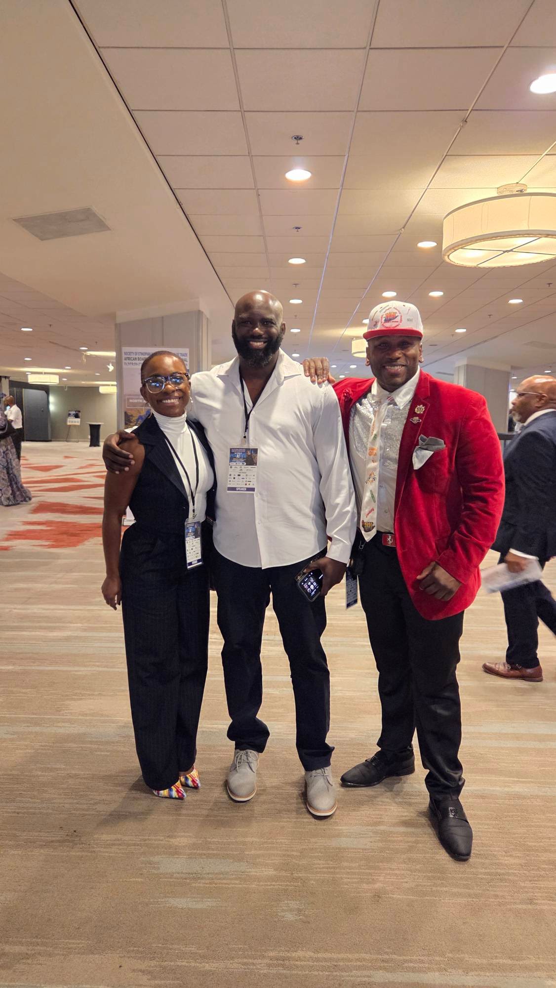 Brown Charité with fellow leaders at the Atlanta conference