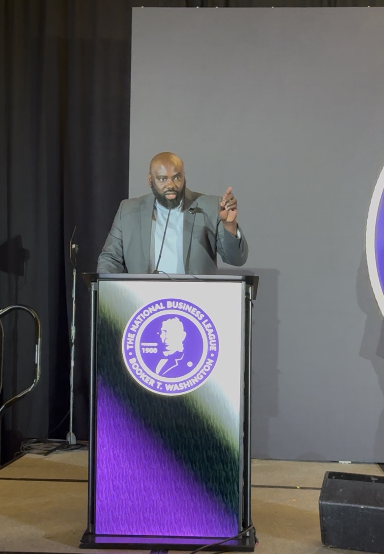 Brown Charité addressing the National Business League Book of AI conference in Atlanta