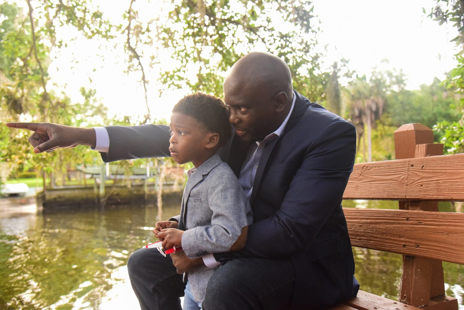 Brown Charité with his son BJ outdoors