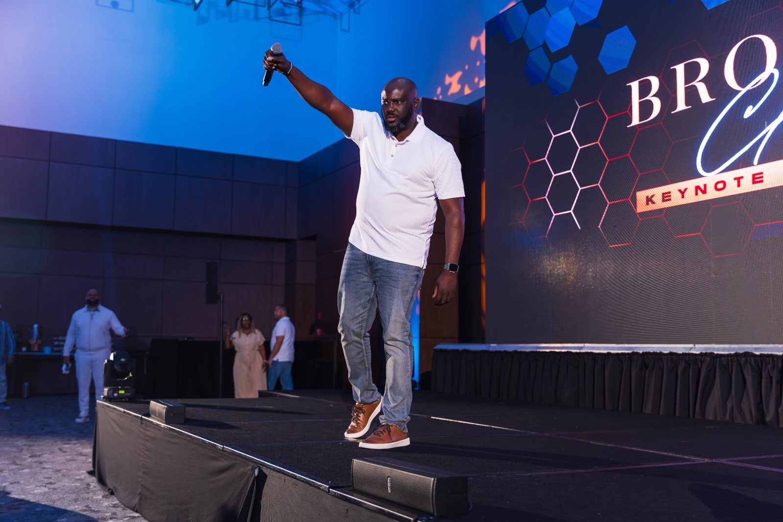 Brown Charité speaking on stage today